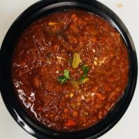 Goat Korma · 16oz bowl Goat korma ,bone in meat ,cooked with onion,Ginger,Garlic,tomato paste,(korma spic...