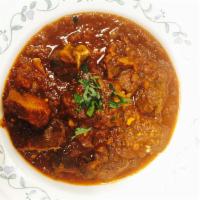 karahi chicken · its bone in chicken ,cooked with onion garlic, ginger tomato paste,indian spice ,gravy
