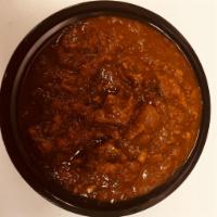 Goat Masala · 16 oz bowl cooked Goat bone in or bone less meat ,onion ginger,garlic and own spices,tomato ...