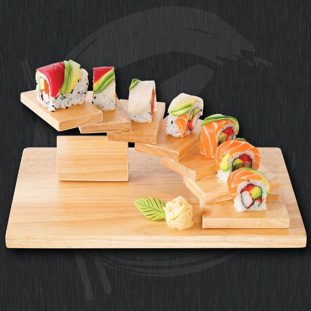 Rainbow Roll · Crab stick, avocado and roe roll with assorted fish.