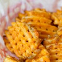 Italian Fries · Oven-baked waffle fries with a mild seasoning.