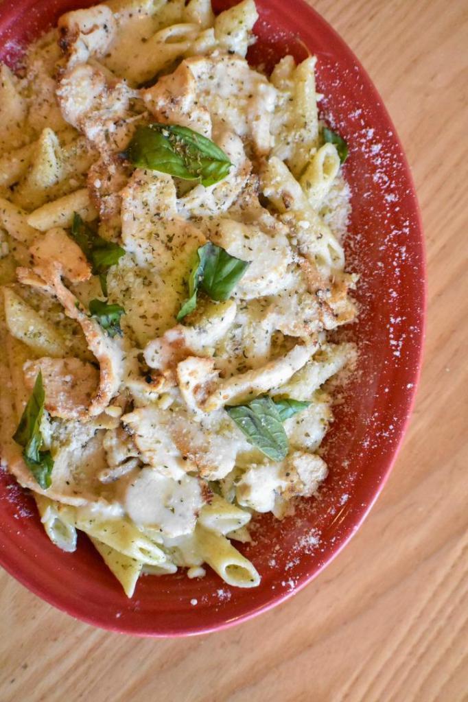 Bkd Chx Pesto · Sliced chicken breast and penne pasta tossed in our creamy pesto alfredo sauce topped with mozzarella and fresh basil.