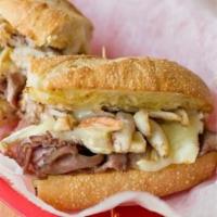 #10 SURF 'N TURF · Lean roast beef, crab meat, melted brie cheese, and old mayo on a toasted sub roll.