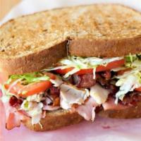 #40 WESTOVER CLUB · Hickory ham, turkey breast, crispy bacon, melted provolone cheese with lettuce, tomato and m...