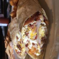 Texas Breakfast Burrito · 3 eggs, bacon, tater tots, pico de gallo and cheddar. Served with tater tots.