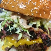 1/2 lb. Pastrami Burger · Huge premium Angus beef patty topped with Swiss cheese, pastrami, pickles and Thousand Islan...