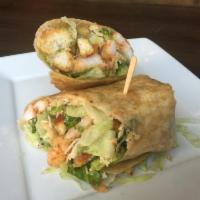 Grilled Chicken Caesar Wrap · Chicken breast, lettuce, parmesan, caesar dressing wrapped in flour tortilla. Served with ch...
