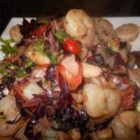 Gamberi alla Toscanaccia · Sauteed shrimp with white beans, bacon, onion, and radicchio, in a white wine sauce.