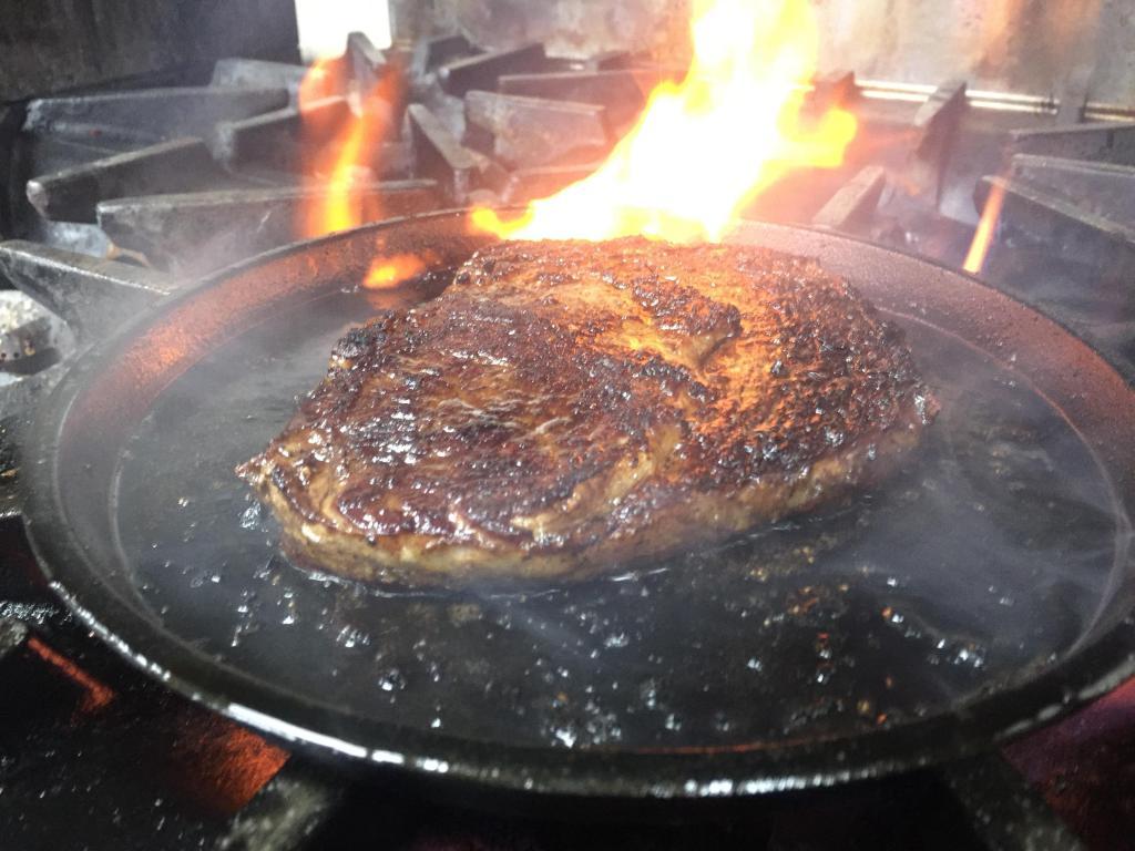 12 oz. Rib Eye Steak · Perfectly aged cut from black angus grad beef brushed with spicy peppercorn gravy or your choice of lemon butter or BBQ sauce. Served with sauteed onions and mushrooms on top. Served with choice of side.