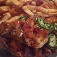 Mango Jalapeno Grilled Chicken And Shrimp · Spicy chicken breast grilled to perfection smothered with jalapeno and mango sauce topped wi...