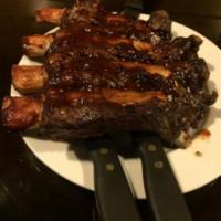 BBQ Beef Back Ribs · A huge rack of ribs tender to the bone cooked with our Affy's spicy BBQ sauce. Served with c...