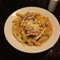Herb Chicken Penne · Caramalized onions, mushrooms, roasted garlic and basil cooked in fresh rose sauce and penne...