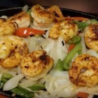 Shrimp Fajita · Garlic shrimp sauteed with a touch of Cajun seasoning over grilled onions and peppers. Serve...