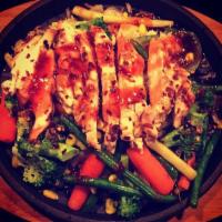 Grilled Chicken Sizzle · GRILLED CHICKEN THINLY SLICED PLACED OVER A MEDLEY OF STIR FRIED VEGETABLES AND RICE DRIZZLE...