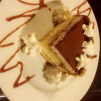 Tiramisu · Italian style lady finger cookies soaked in mocha coffee topped with mascarpone whipped crea...