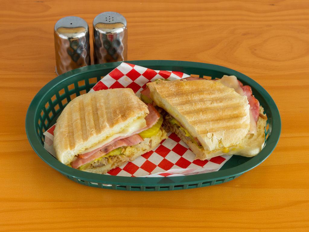 El Cubano Sandwich · Pork shoulder, ham, Swiss, honey mustard and pickles.