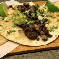 3 Pieces Carnitas Tacos · Seasoned beer-braised pork, tomatillo salsa, guacamole and sour cream folded in grilled corn...