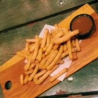 Churro Fries · Perfectly fried dough pastry sprinkled with cinnamon sugar. Served with dulce de leche for d...