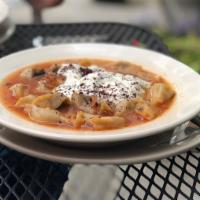 Manti - Armenian open faced dumplings · Homemade open face dumplings stuffed with ground beef in chicken broth, topped with garlic y...