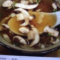 Onion Soup · Chicken broth with mushrooms and crispy onion.