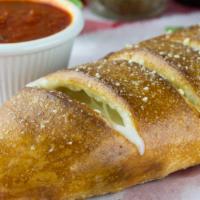 Veggie Stromboli · Tomato sauce, mozzarella cheese, zucchini, peppers, onions and eggplant.