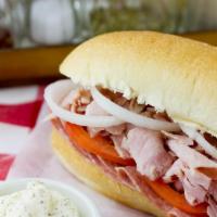 Traditional Sandwich · Ham, provolone, tomato, salami, onions and mayonnaise.