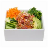 Crunchy Poke Bowl · Tuna or salmon, spicy mayo, masago, scallions, tempura flakes and sesame seeds.