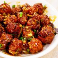 Manchurian · House special golden chicken/cauliflower/Veg in mildly spiced soya garlic sauce cooked with ...
