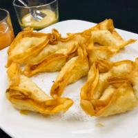 Crab Rangoon · 8 pieces. Crispy wonton with cream cheese, vegetables and crab meat.
