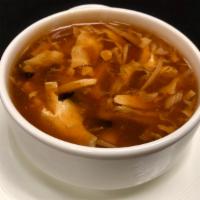 Hot and Sour Soup  · Bamboo shoots, wood ear, day lily buds, tofu. Spicy.