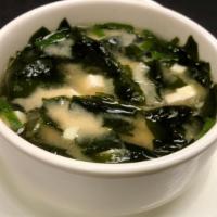 Miso Soup  · Seaweed, tofu cubes and scallions. Vegetarian.