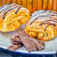Chocolate Croissant · Premium imported Belgian dark chocolate inside handcrafted all-butter croissant, topped with...