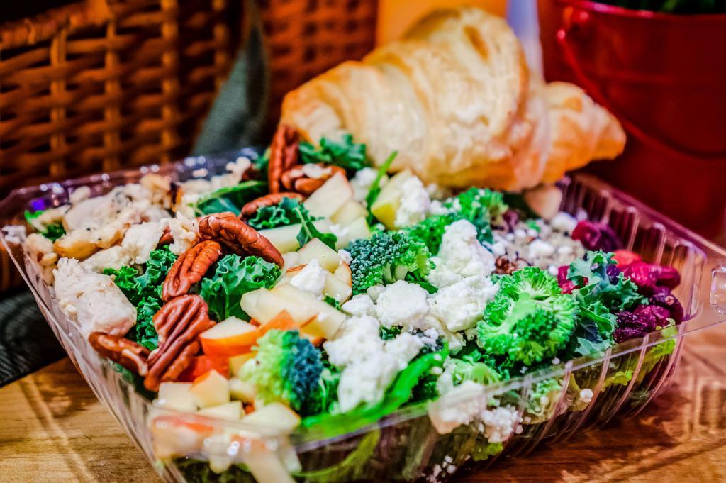 Cranberry Chicken Kale Salad with Croissant · Lemon chicken, apples, cranberries, quinoa, feta cheese, and pecans on a bed of crisp kale served with our signature butter croissant.