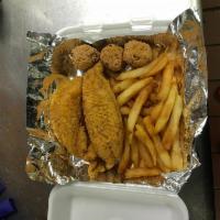 Fried Fish Tray · Two fillets catfish ,corn on the cob,fries and hush puppies