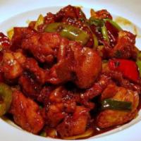 Chicken Chili · cubed chicken stir fried indo chinese style with pepper in tangy sauce