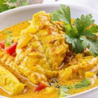 Coconut fish curry · fish cook with garlic and herb with coconut milk curry