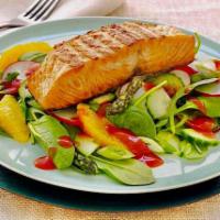 14. Salmon Salad · Salmon on a bed of spring mix with tomato, onion dressing. Served with pita bread.
