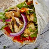 18. Chicken Shish Kebab Wrap · Tender marinated chicken on skewer charbroiled pulled onto lavash with lettuce and tomatoes.