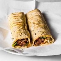 19. Adana Kebab Wrap · Charbroiled grilled minced lamb with parsley, red onions, and spices.