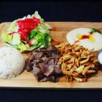 2. Combo Gyros Plate · Slow cooked, thin sliced, marinated lamb, beef and chicken gyro. Served with rice, salad, pi...