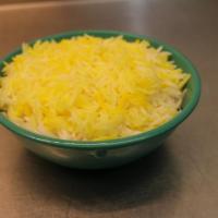 Saffron Rice a la carte · Jasmine rice topped with our golden saffron rice.