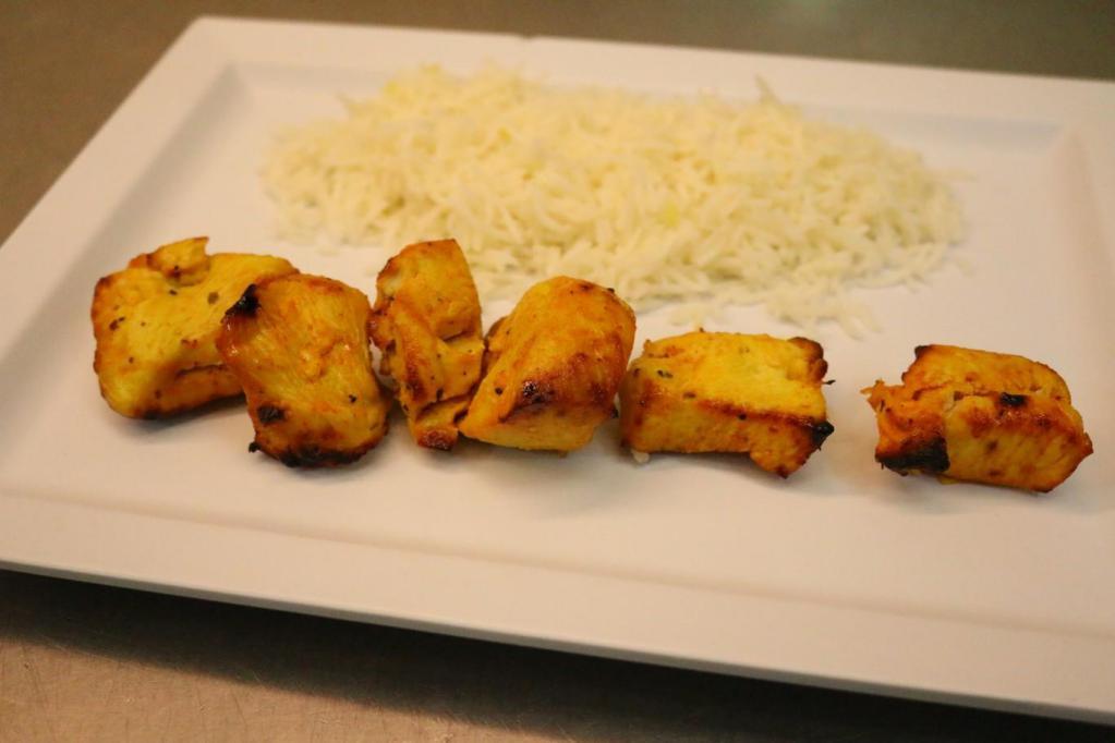 Kids Chicken and Rice Combo · Grilled chicken kabob served with rice.