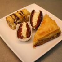 Dessert Sampler Plate · 1 baklava, 2 stuffed dates, and 1 Mediterranean nut roll