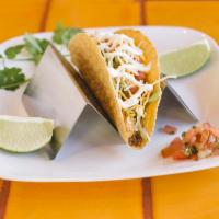 Beef Taco · Hard shell, ground beef, tomatoes, cheese and crema mexicana. With soft corn tortilla, speci...