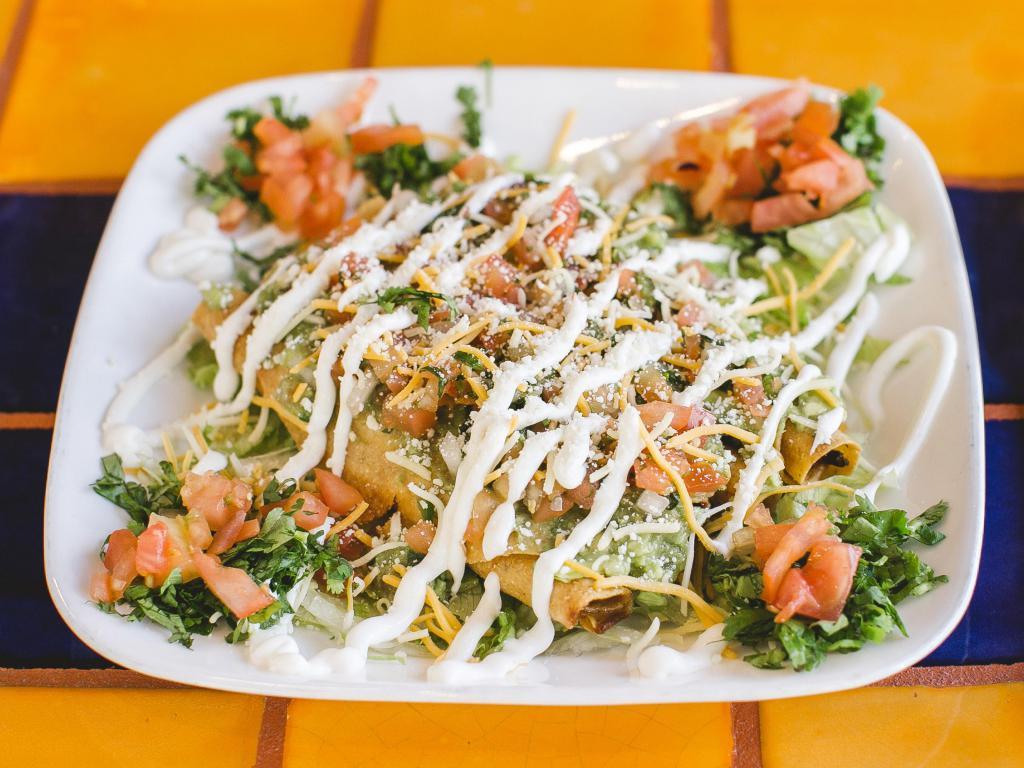 Taquitos Taco · Rolled tacos, shredded beef or shredded chicken, guacamole and creama mexicana.