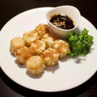 Shumai · Nine shrimp dumplings.