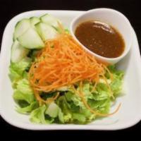 Sea Lion House Salad · Iceberg lettuce, carrot and cucumber with ginger dressing .