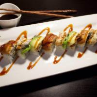 Sea Lion · Eight pieces. Spicy salmon roll with eel and avocado on top. Raw.