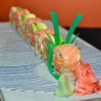 Orange Dragon Roll · Spicy salmon and crunch inside topped with salmon and avocado.