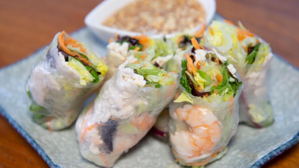 Fresh Rolls · Fresh vegetables, cooked shrimp, and chicken wrapped in rice paper, served with plum sauce and peanuts.